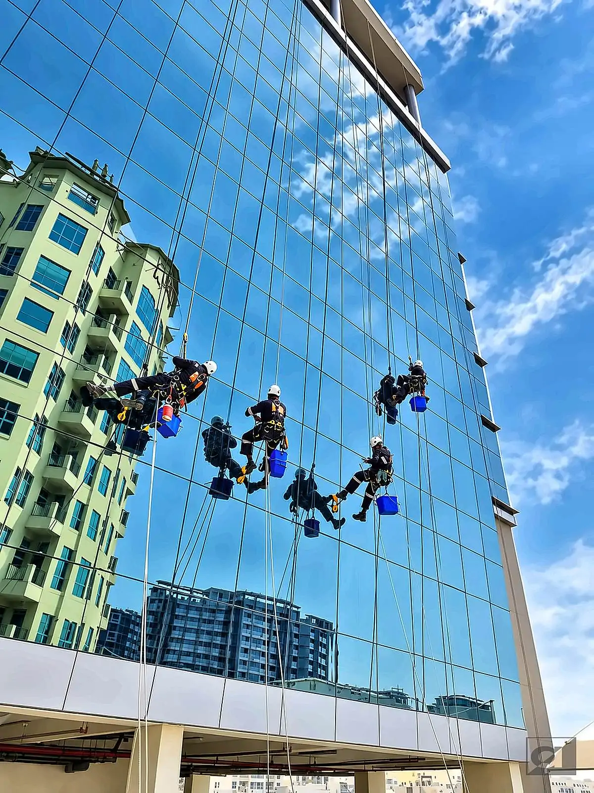 Façade Cleaning – Glass Tower – Allied Middle East rope access, Bahrain