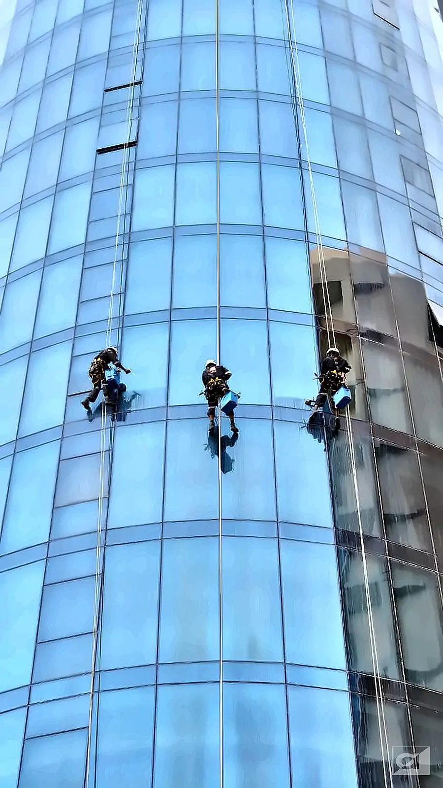 Façade Cleaning – Curved Glass – Allied Middle East rope access, Bahrain