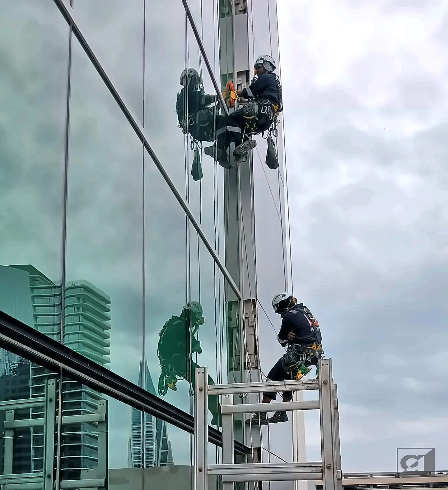 Glass Façade Maintenance – Allied Middle East rope access, Bahrain