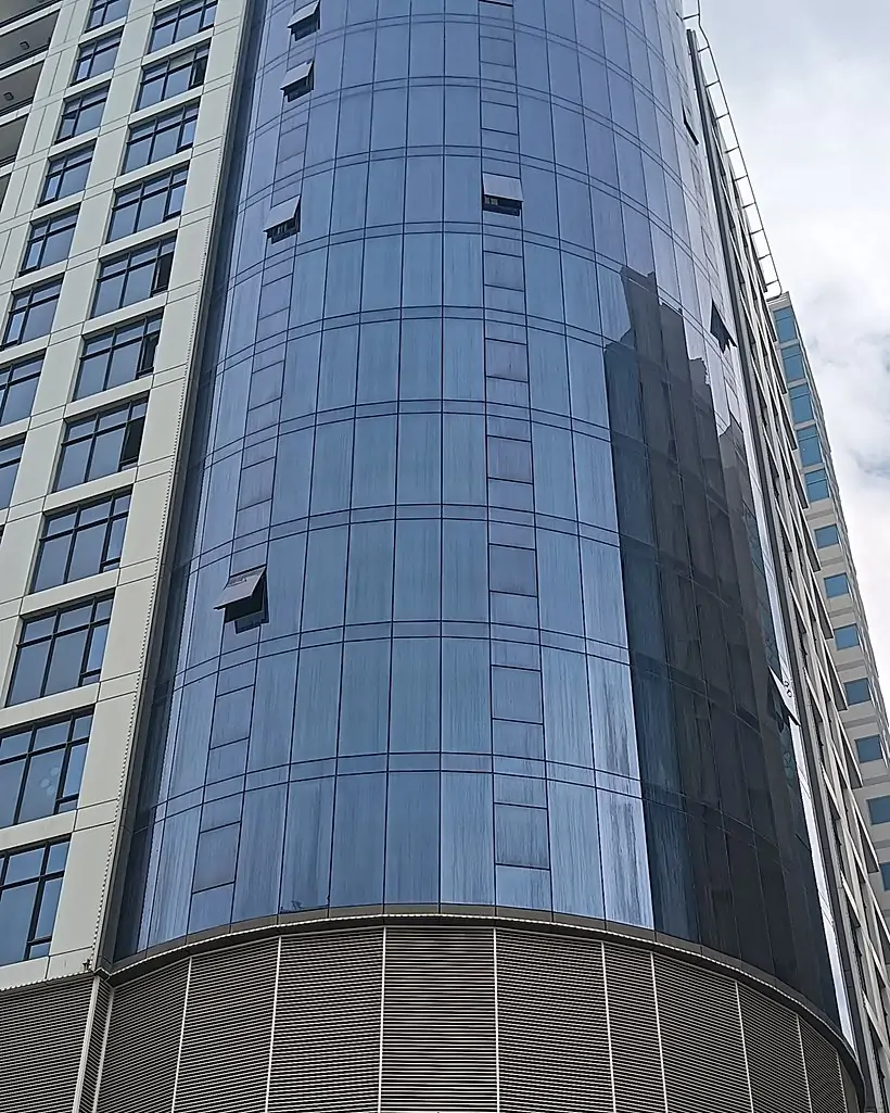High-rise glass tower in Bahrain serviced by Allied Middle East rope access